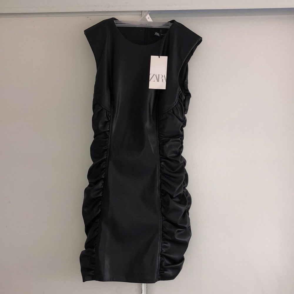 Black faux leather Zara mini dress. NEVER worn.